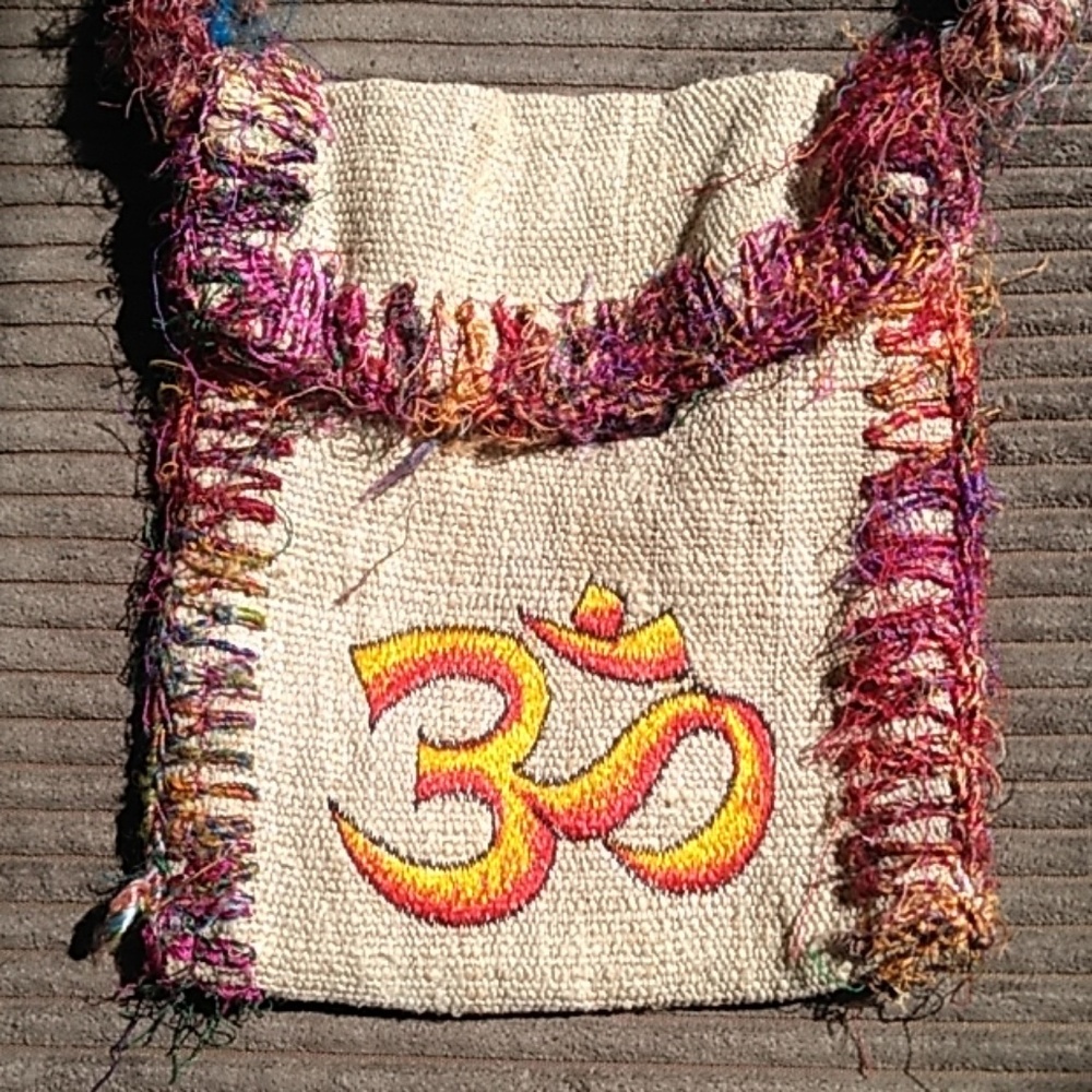 OM symbol crossbody bag